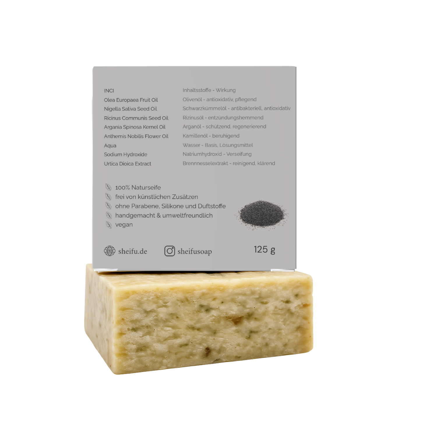 Zutatenliste und Wirkung der Schwarzkümmel Naturseife auf grauer umweltfreundlicher Rückseite
